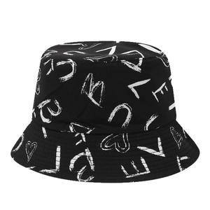 Black cotton bucket hat with white graffiti lettering and heart patterns for sun protection