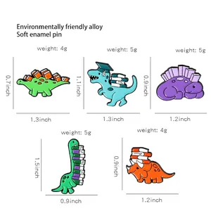 Cute cartoon dinosaur enamel pins set with books for student backpack accessories