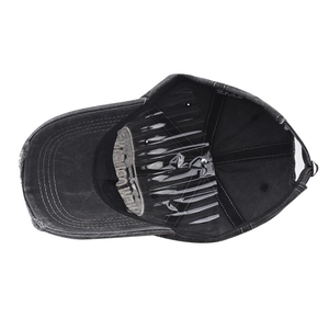 Detail view of washed cotton baseball cap interior with vintage embroidery and inner lining