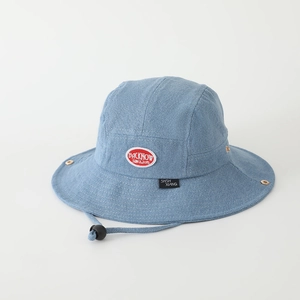 Detailed view of light blue denim bucket hat with red patch and adjustable wind cord