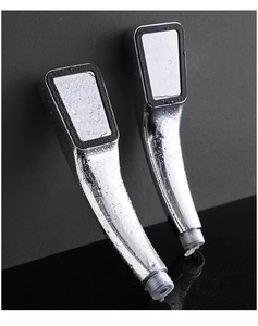 Detail of high-pressure silver handheld shower heads with 300 holes and chrome finish
