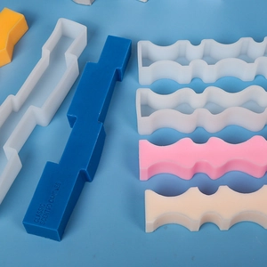DIY silicone molds for geometric wavy scented candles with colorful wax samples