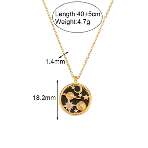 Gold stainless steel celestial necklace with moon and star pendant on a white background