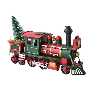 Vintage metal Christmas train figurine with red and green finish and mini tree decoration