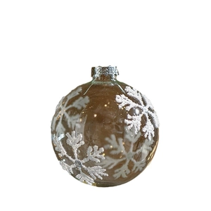 Clear glass Christmas ball with white sparkling snowflake patterns and silver top cap