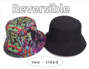 Detailed view of reversible bucket hat with colorful psychedelic print and solid black side
