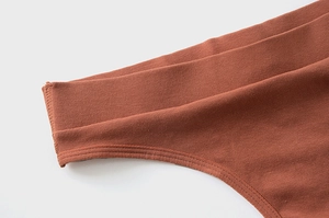 Macro detail of breathable ribbed cotton thong with high elasticity and seamless sewing