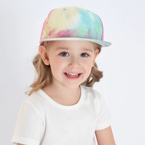 Detail of a child wearing a colorful tie-dye hip-hop baseball cap with a flat brim