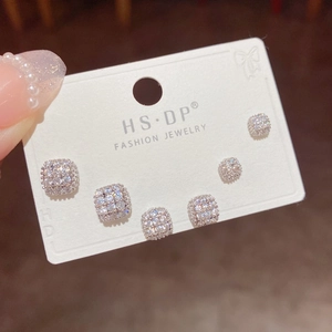 Close-up of S925 silver square stud earrings with micro-pave cubic zirconia set