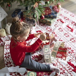 Red Merry Christmas money pull box with gift bags for festive holiday party decor