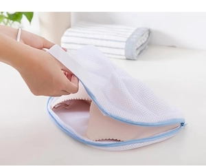 Close-up of fine mesh bra laundry bag with zipper for washing machine protection