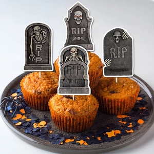 Halloween tombstone cupcake toppers with RIP and skull designs for party decoration