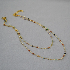 Double-layer gold necklace featuring colorful natural stones and adjustable lobster clasp