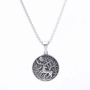 Vintage stainless steel necklace with round elk and forest relief pendant on white background