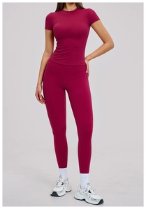 Detailed close-up of quick-dry compression fabric on a high-waist women's berry yoga set