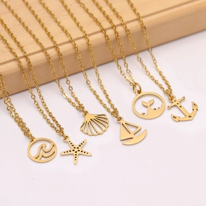 Colliers en acier doré avec pendentifs océaniques étoile de mer coquillage et ancre