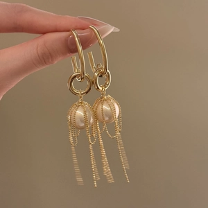French vintage style gold U-shape pearl tassel earrings for women with elegant finish