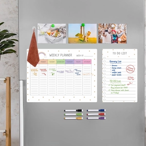Magnetic weekly planner and to-do list set with six colorful markers on a fridge