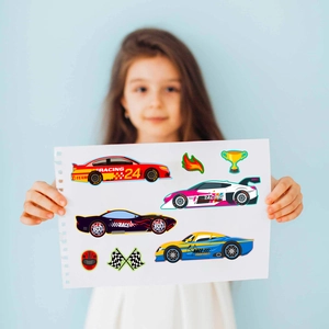 Detail of DIY racing car stickers for kids showing colorful vehicle decals and trophies