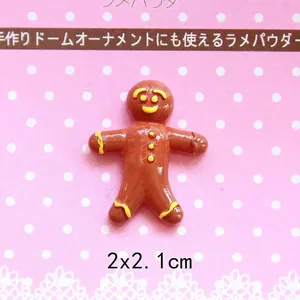 Macro view of 2x2.1cm gingerbread man resin flatback for DIY craft accessories