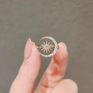 Exquisite gold-plated open ring featuring a sparkling sun and crescent moon design