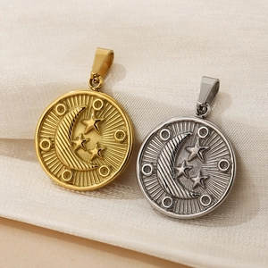 Detail showing vintage sun and moon engraved pendants in gold and silver finish