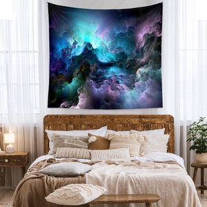 Bohemian galaxy tapestry with abstract nebula pattern hanging over a bedroom bed frame