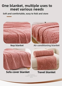 Close-up of pink flannel blanket featuring 3D jacquard butterfly textures and soft fabric