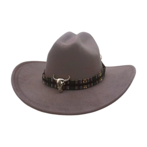 Detailed view of grey felt cowboy hat with ethnic band and silver bull skull.