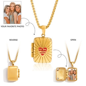 Custom gold tarot locket with heart carving and photo frame detail on box chain