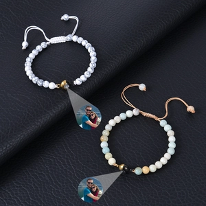 Custom photo projection bracelet with 6mm natural stone beads on black leather background