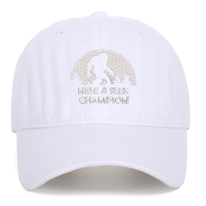 Detail of embroidered Hide & Seek Champion sasquatch on white vintage cotton baseball cap