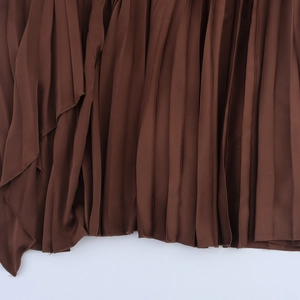 Brown pleated one-shoulder dress featuring waist buckle details and vertical folds