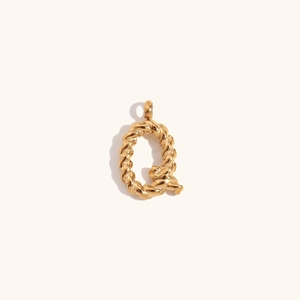 Close-up of 18K gold plated letter Q pendant with twisted rope texture detail