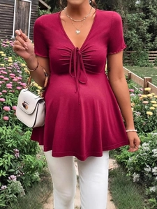 Short sleeve maternity V-neck dress with drawstring front in deep magenta knit cotton