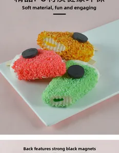 Detailed view of three colorful PVC fruit popsicle fridge magnets with strong back magnets