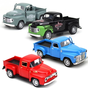Set of four vintage alloy pickup truck models with opening doors in various colors
