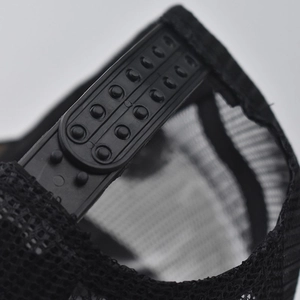 Detail of black mesh trucker hat with adjustable double-row snapback closure for custom fit