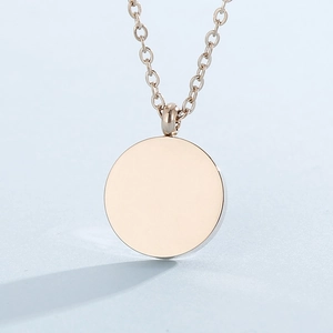 Rose gold minimalist coin pendant necklace with a fine bead chain for women
