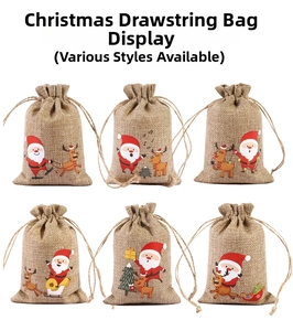 Detail of six jute Christmas drawstring bags featuring festive Santa and reindeer prints
