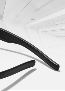 Streamlined temples of black sports sunglasses with ergonomic hand-polished finish