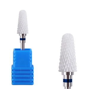 White bullet ceramic nail drill bit with blue ring marker on a metal shank