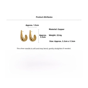 Polished gold teardrop earrings in copper metal, size 3.3cm by 1.5cm detail view