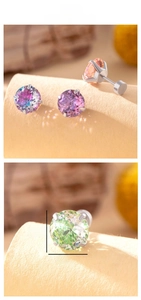 Detailed view of 8mm multi-color gradient zircon stud earrings in 4-prong steel setting