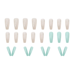 Set of 24 mint green and milky white coffin press-on nails with silver star patterns