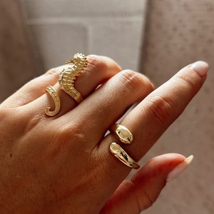 Adjustable stainless steel sea horse and teardrop open rings in gold finish