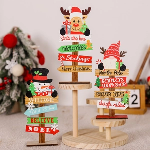Christmas wooden tabletop decor featuring snowman, reindeer and gnome figures on stands
