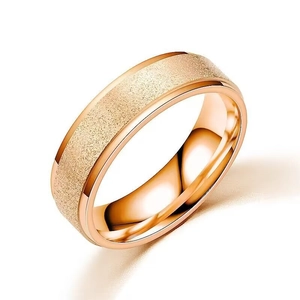 Detail view showing the frosted texture and rose gold finish of the titanium steel ring.