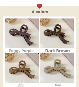 Macro detail of matte bow claw clip in four colors including coffee and khaki tones