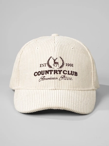 Detailed close-up of corduroy baseball cap featuring vintage elk club embroidery